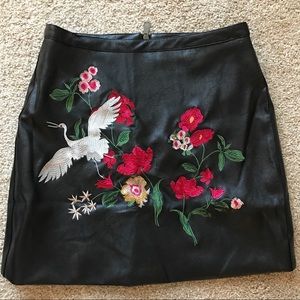 Faux leather embroidered skirt